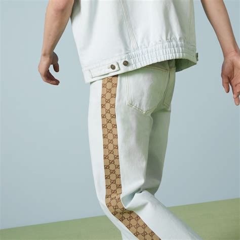 gucci eco washed denim|Washed organic denim pant with GG in light blue .